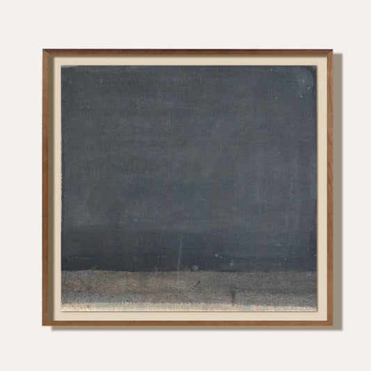 Framed artwork with a dark abstract design on a white background