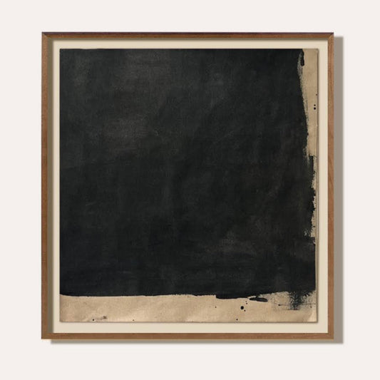 Framed abstract artwork with black and beige tones on a white background