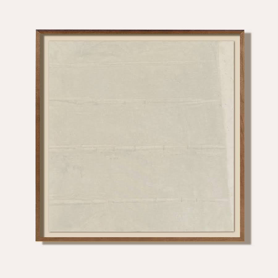 Framed artwork with a plain background