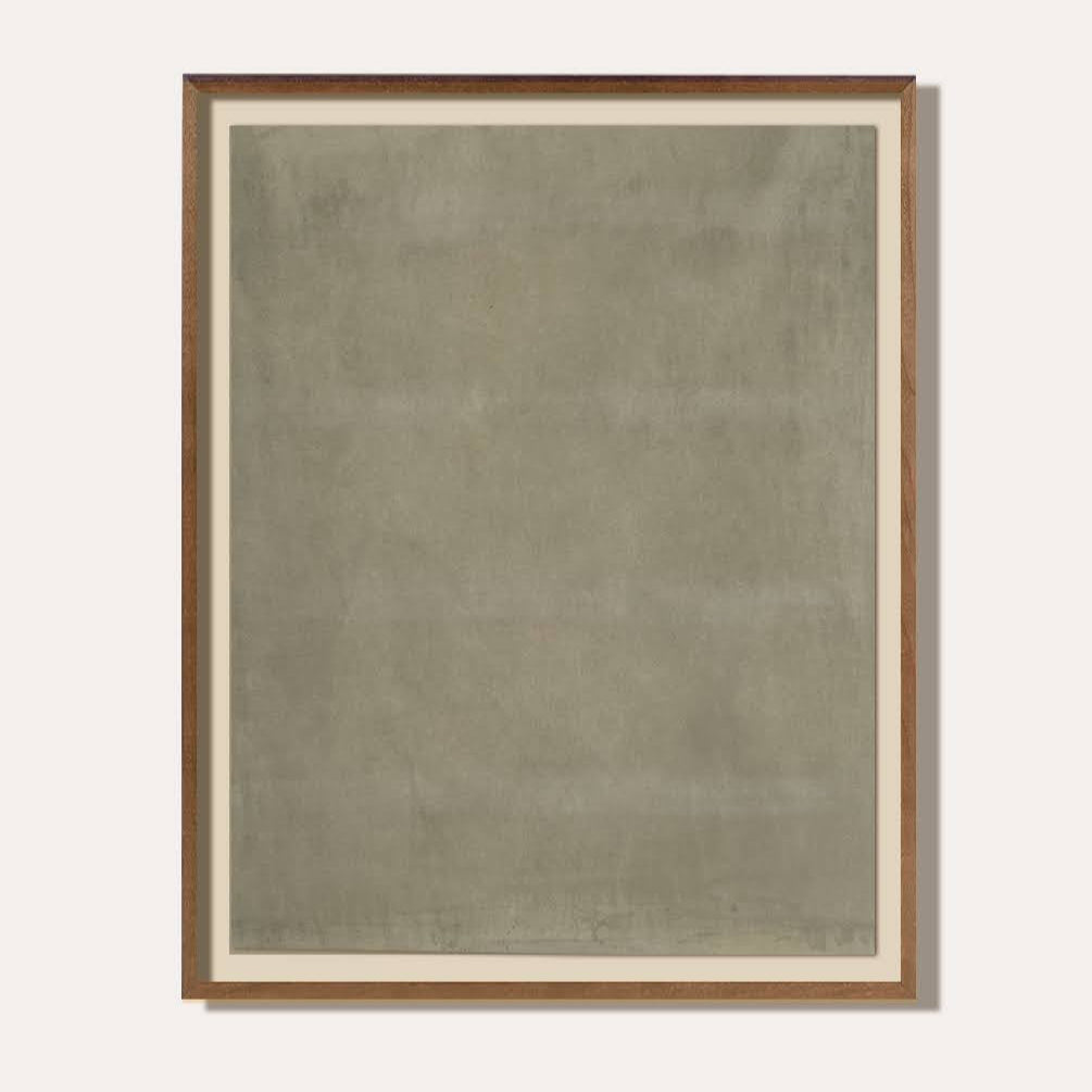 Framed abstract painting with a textured surface on a white background