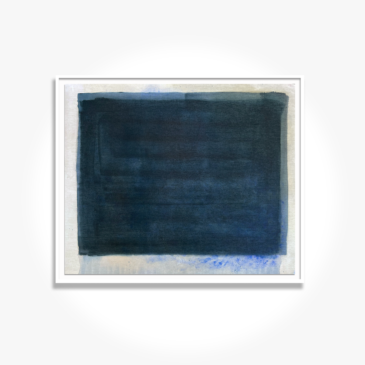A framed mixed media artwork featuring shades of blue and beige, dyed on cotton canvas and mounted under glass.