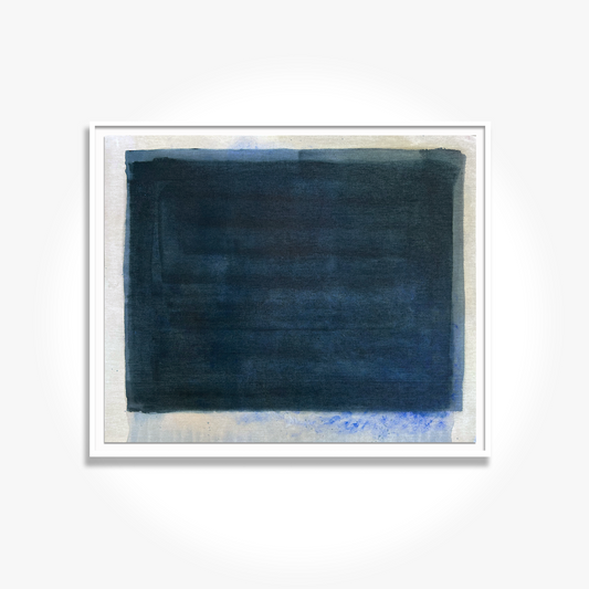 A framed mixed media artwork featuring shades of blue and beige, dyed on cotton canvas and mounted under glass.