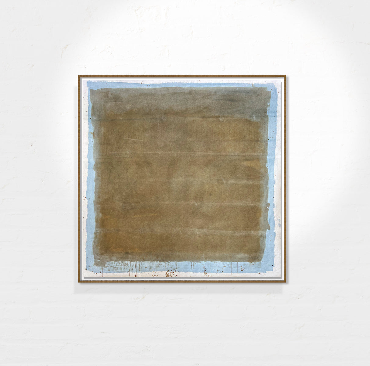 A mixed media artwork on cotton canvas with a predominantly beige and blue color palette, framed in a custom-made wooden frame.