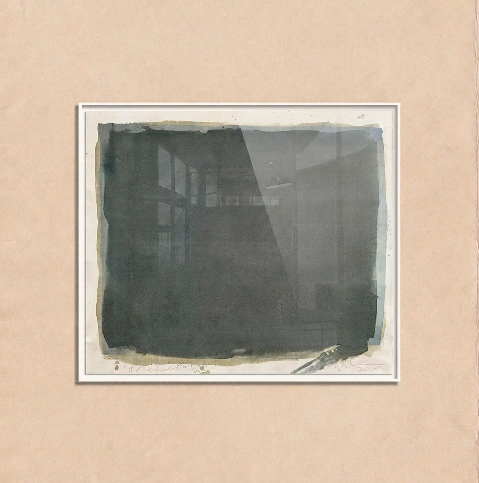 Framed black and white abstract artwork on a beige wall by makelberge