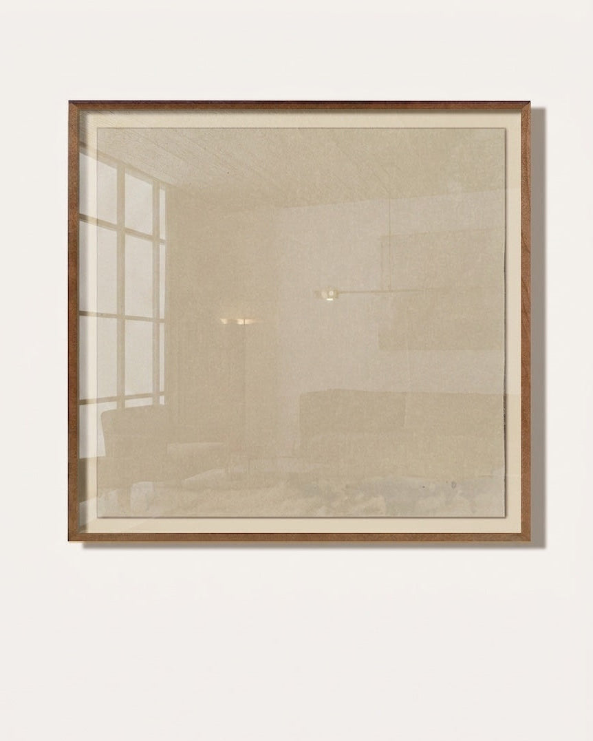 Framed makelberge artwork on a white wall