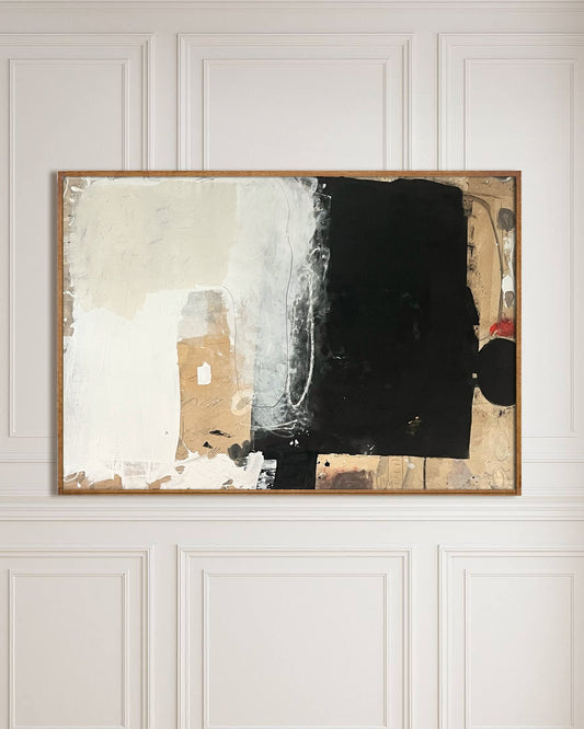 Abstract painting on a white paneled wall