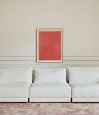 White sofa in a room with a red abstract painting on the wall.