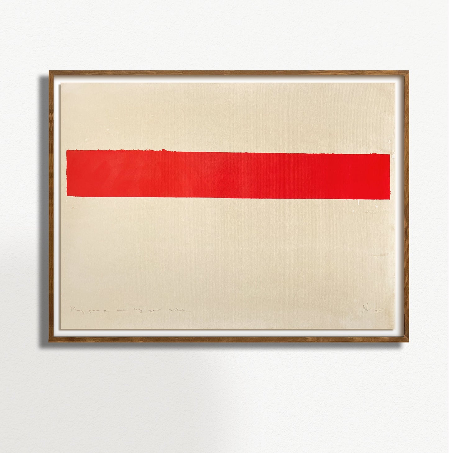 Framed artwork with a red horizontal stripe on a beige background