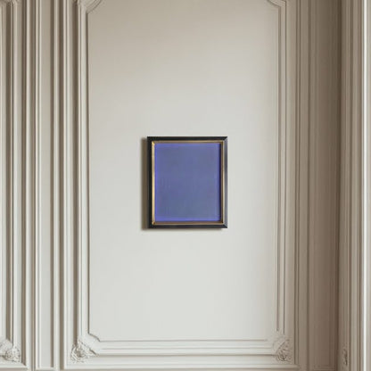 Decorative wall paneling with a framed blue artwork in a room with large windows.